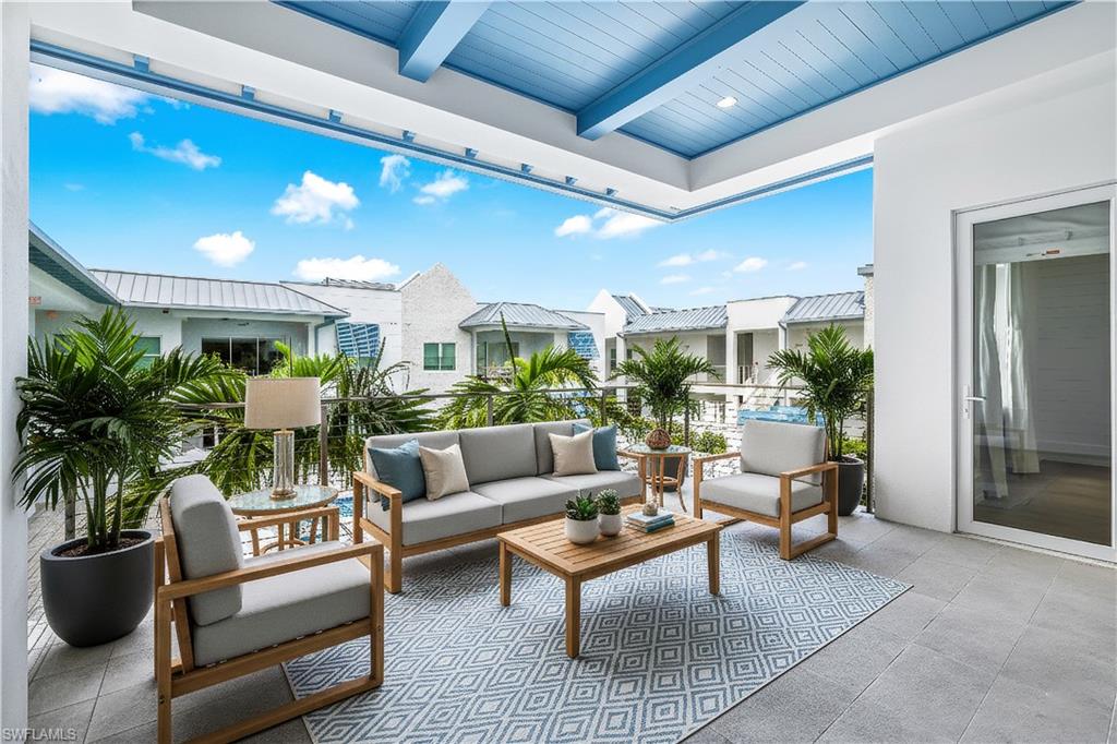 201 8th Street South, Unit 308 Naples, FL 34102 - Photo 6 of 33 Lanai virtually staged.