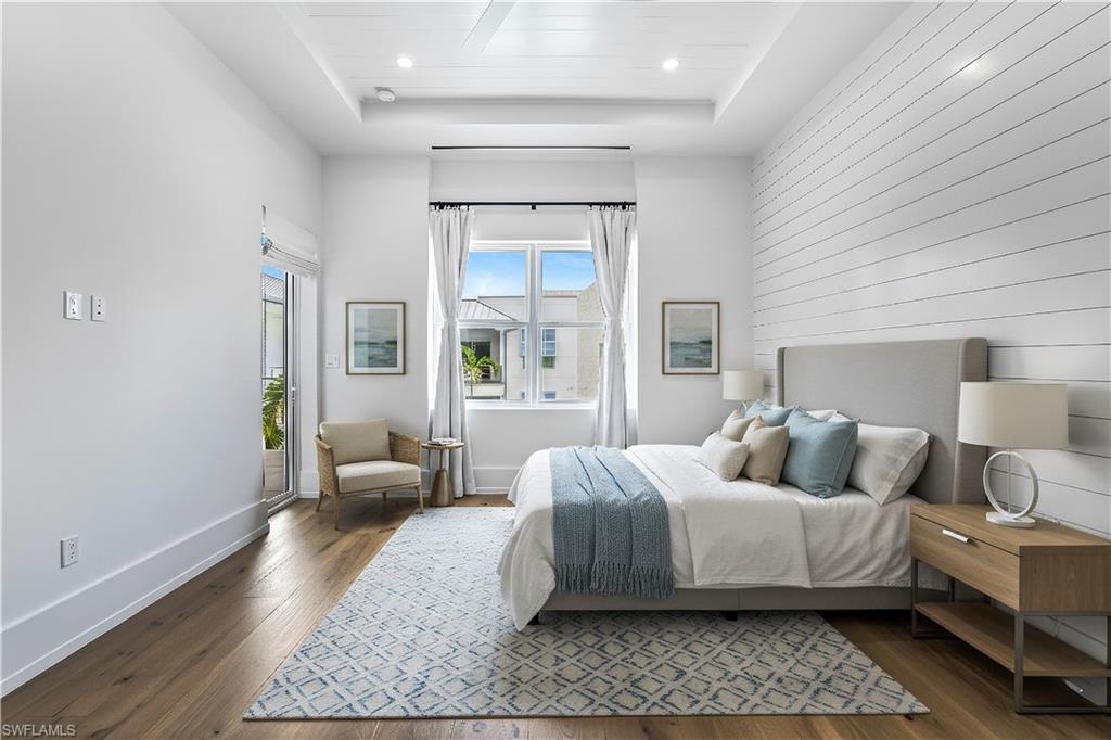 201 8th Street South, Unit 308 Naples, FL 34102 - Photo 8 of 33 Primary bedroom virtually staged