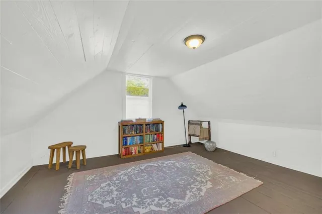 a view of a livingroom with furniture and window
