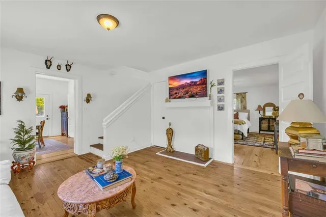 a workspace with furniture and wooden floor