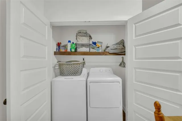 a utility room with dryer and washer