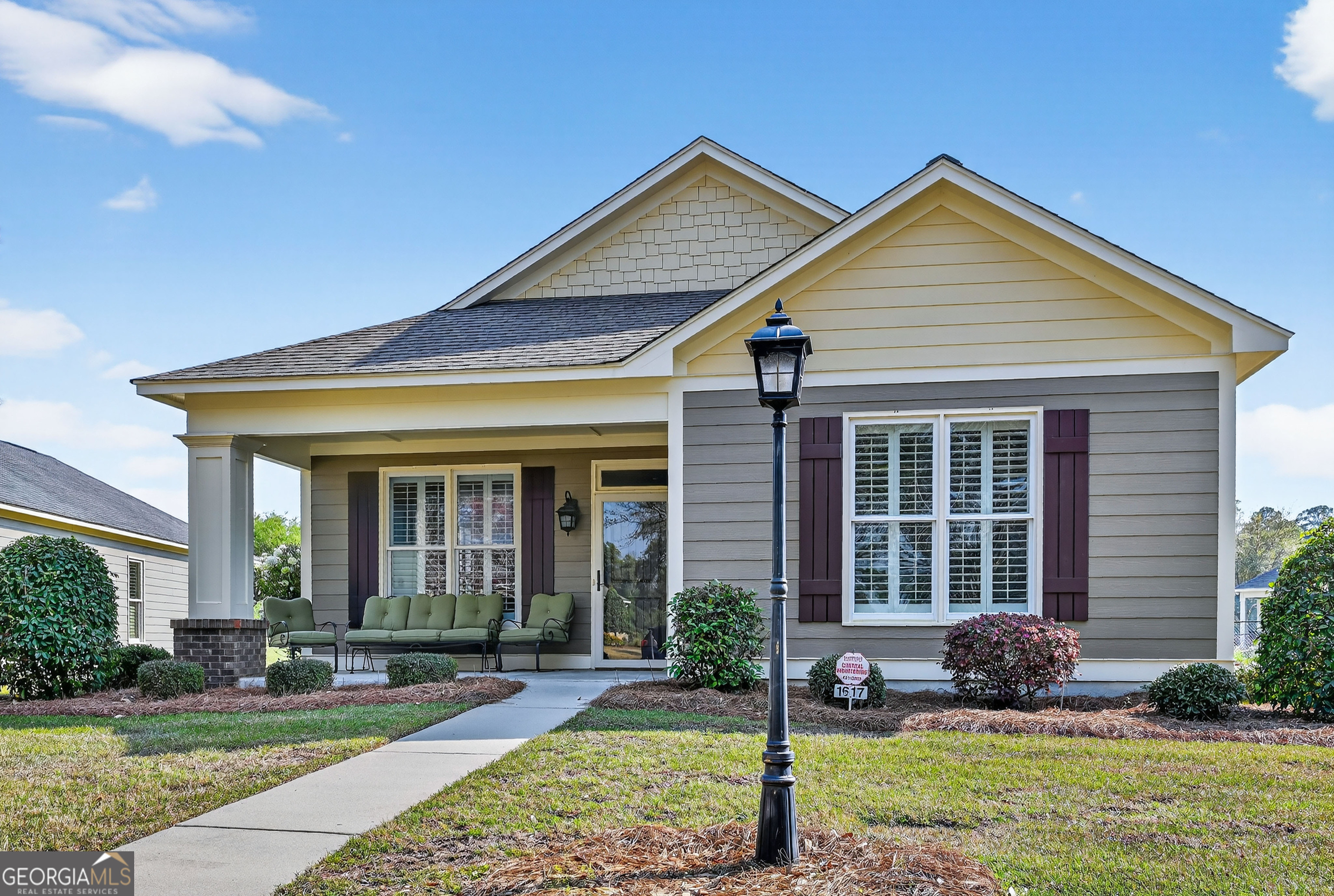 1617 Red Oak Lane Albany, GA 31701 - Photo 1 of 36 a front view of a house with a yard