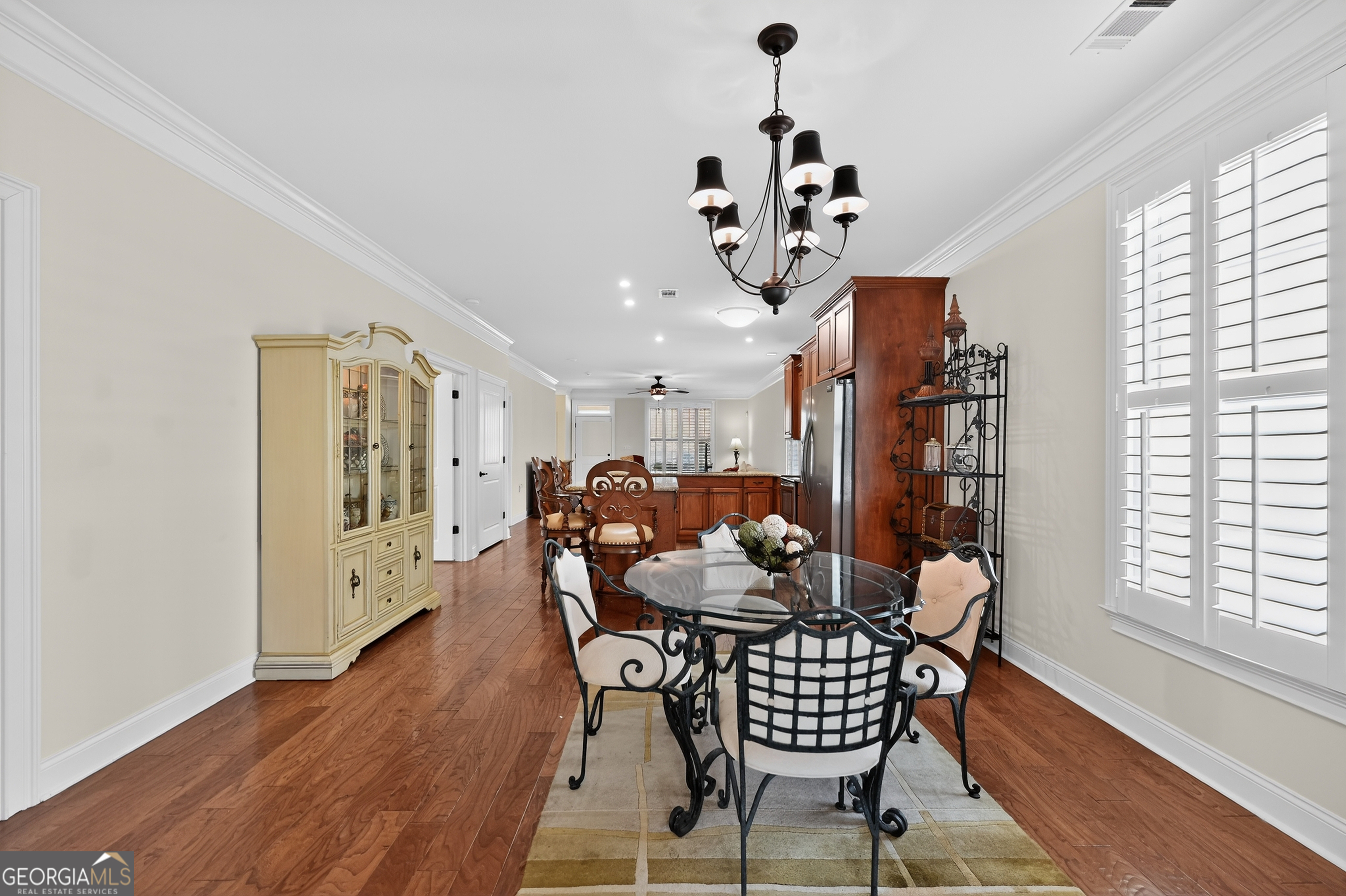 1617 Red Oak Lane Albany, GA 31701 - Photo 15 of 36 a dining room with furniture a chandelier and wooden floor