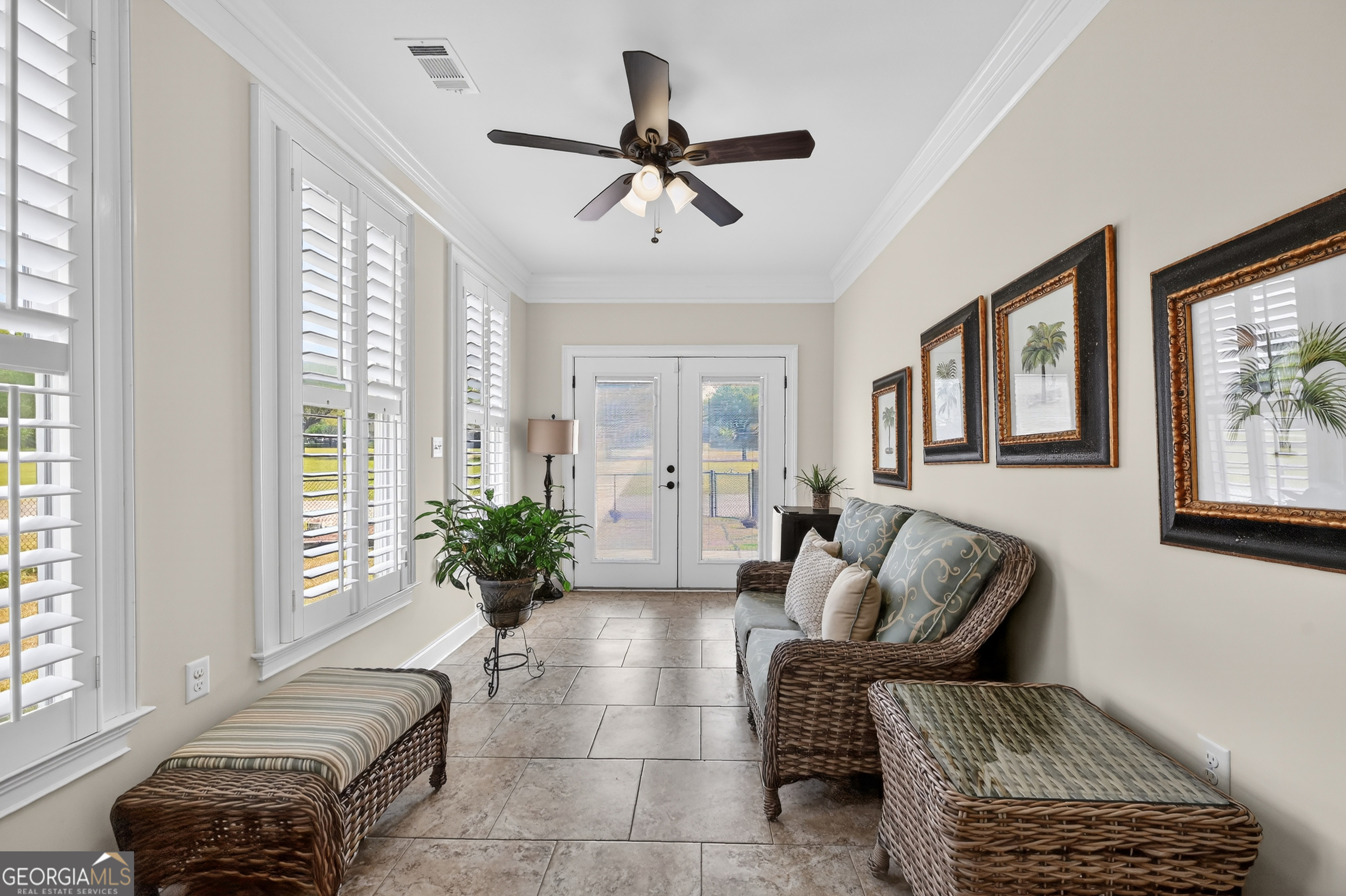 1617 Red Oak Lane Albany, GA 31701 - Photo 29 of 36 a living room with furniture ceiling fan and a window