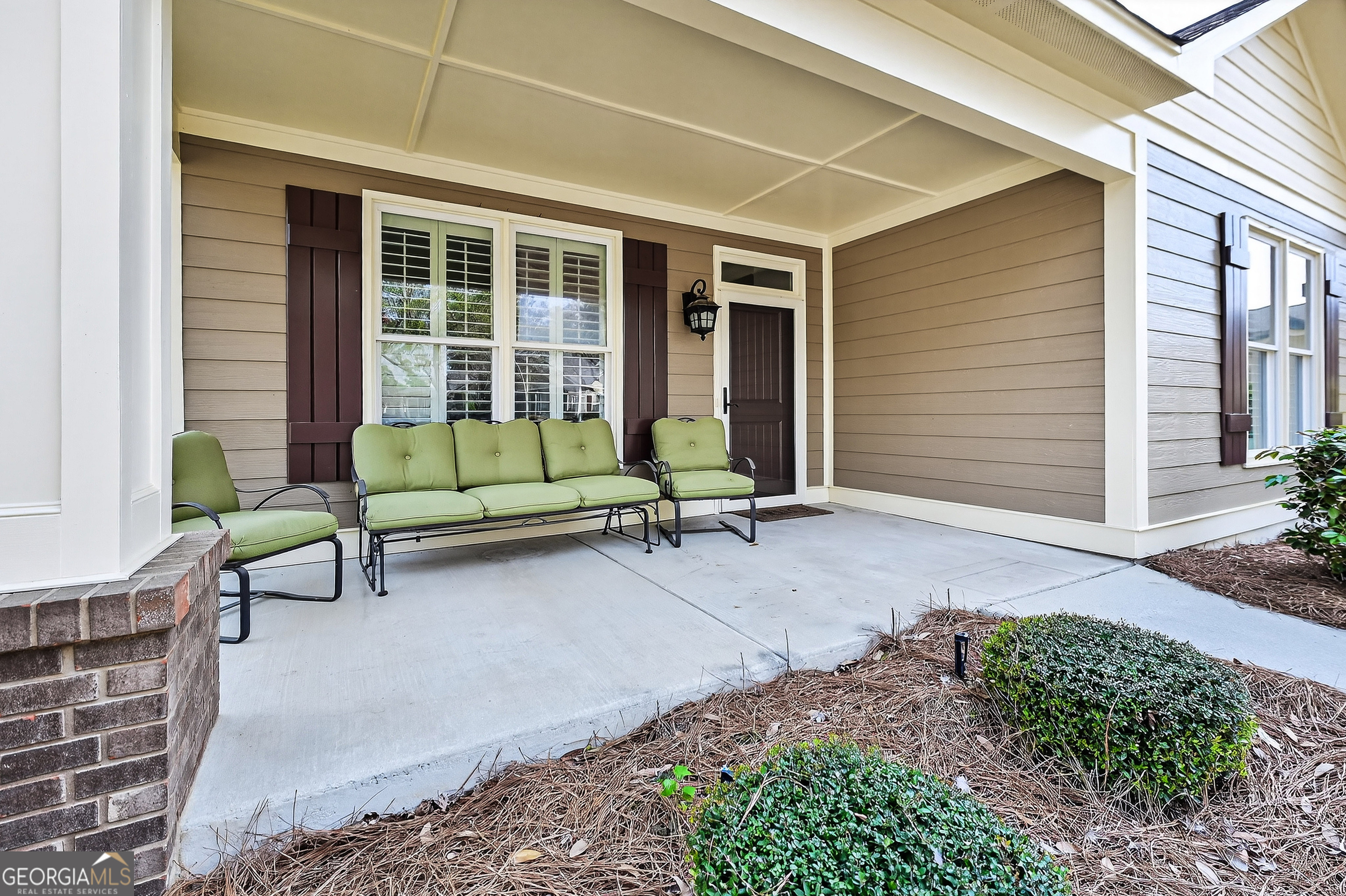 1617 Red Oak Lane Albany, GA 31701 - Photo 3 of 36 a house with a bench in patio