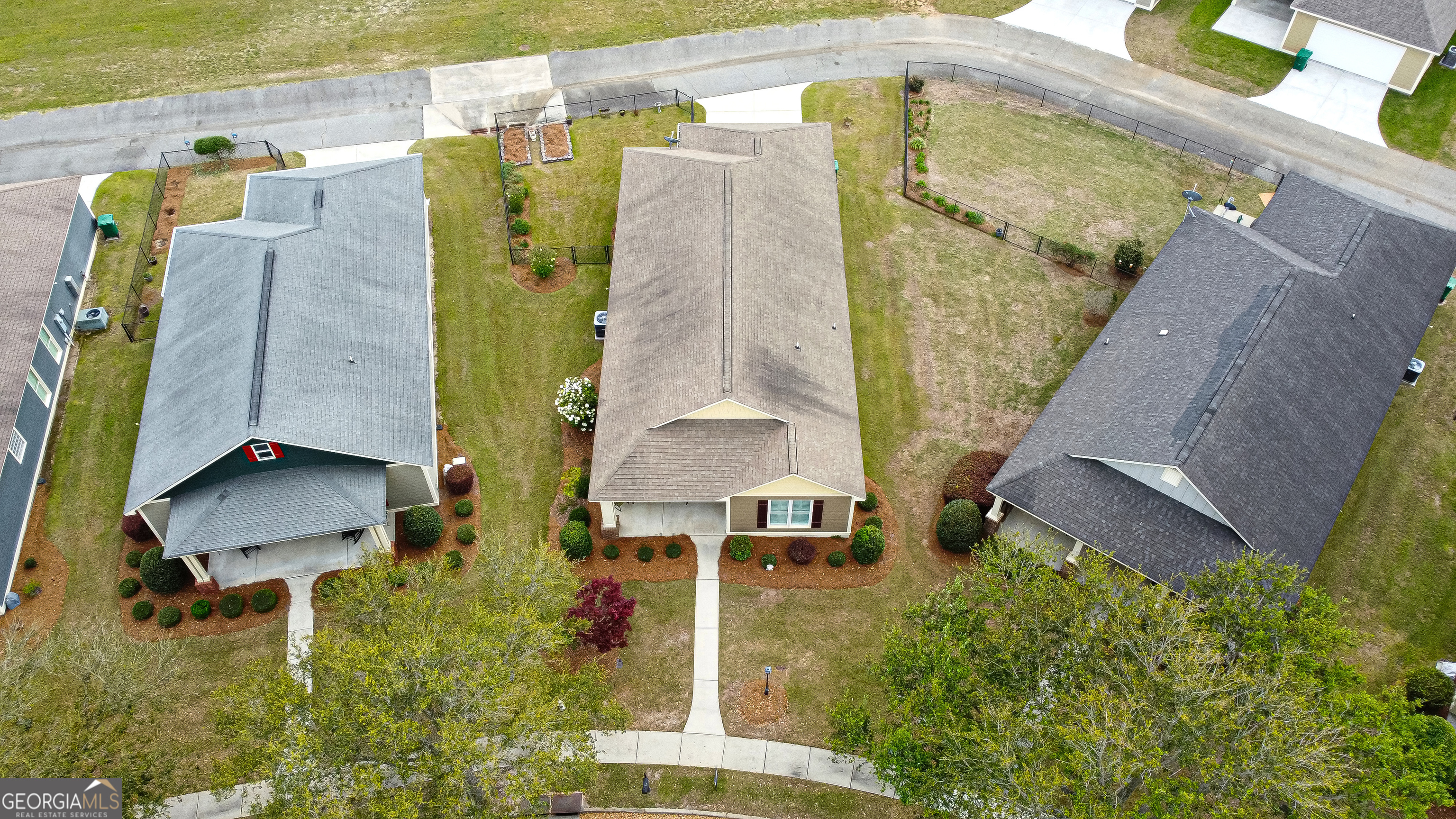 1617 Red Oak Lane Albany, GA 31701 - Photo 35 of 36 a aerial view of a house with a swimming pool