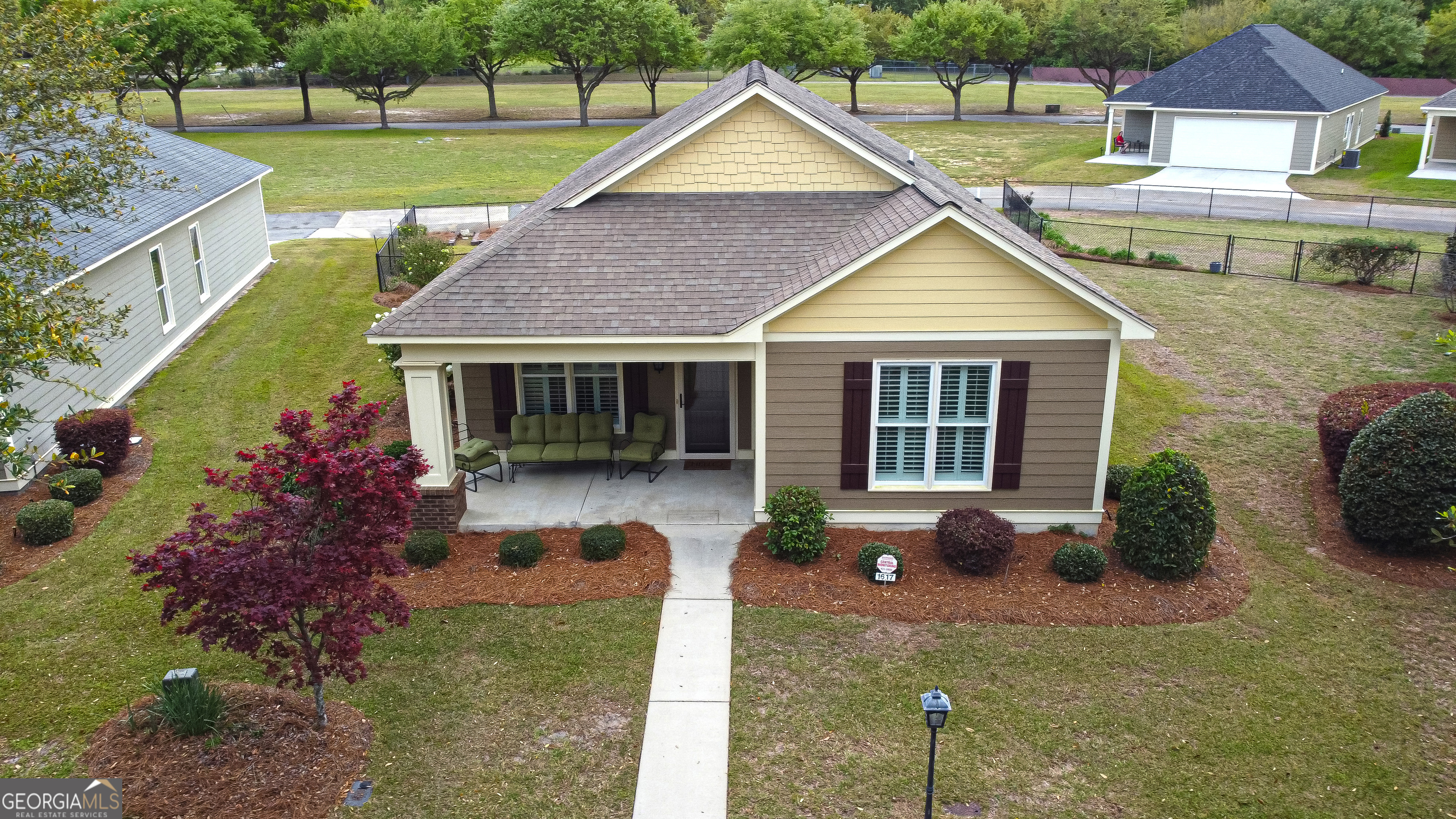 1617 Red Oak Lane Albany, GA 31701 - Photo 36 of 36 a front view of a house with garden
