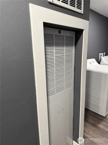 a view of a room that has a window