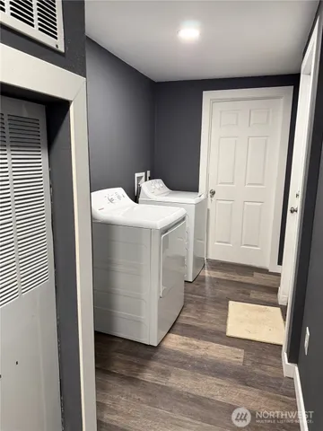 a utility room with washer and dryer