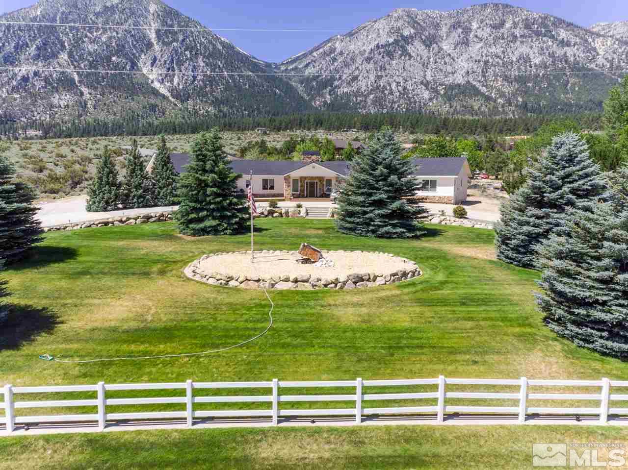 796 Foothill Road Gardnerville, NV 89460 - Photo 12 of 38 a view of a house with a big yard and potted plants