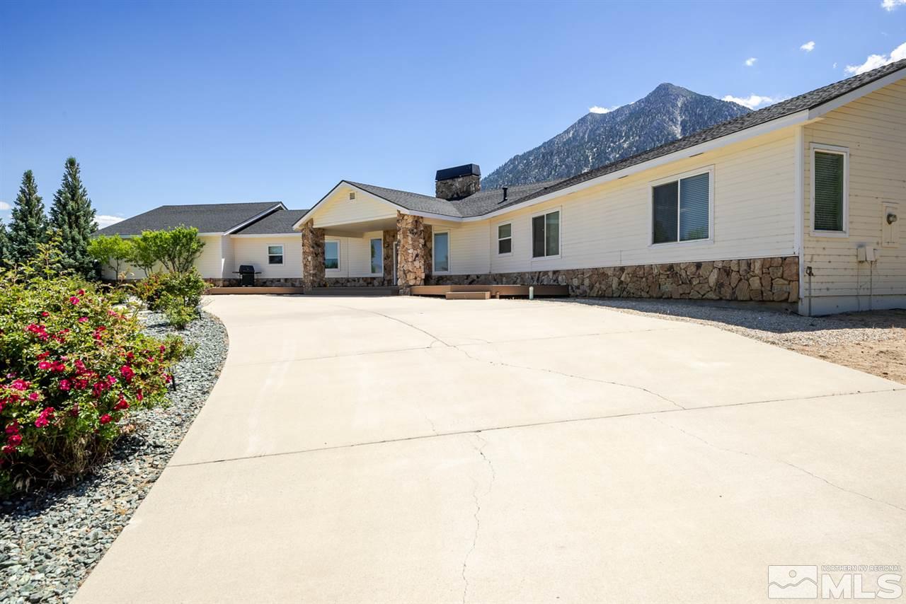 796 Foothill Road Gardnerville, NV 89460 - Photo 14 of 38 a front view of a house with a yard