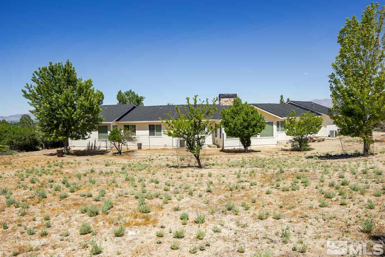 796 Foothill Road Gardnerville, NV 89460 - Photo 16 of 38 a view of a backyard of a house