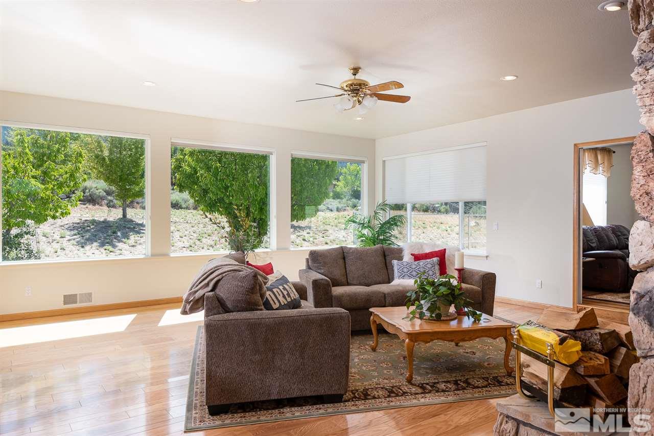 796 Foothill Road Gardnerville, NV 89460 - Photo 31 of 38 a living room with furniture and a large window
