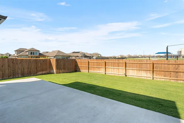 a view of an outdoor space and a yard