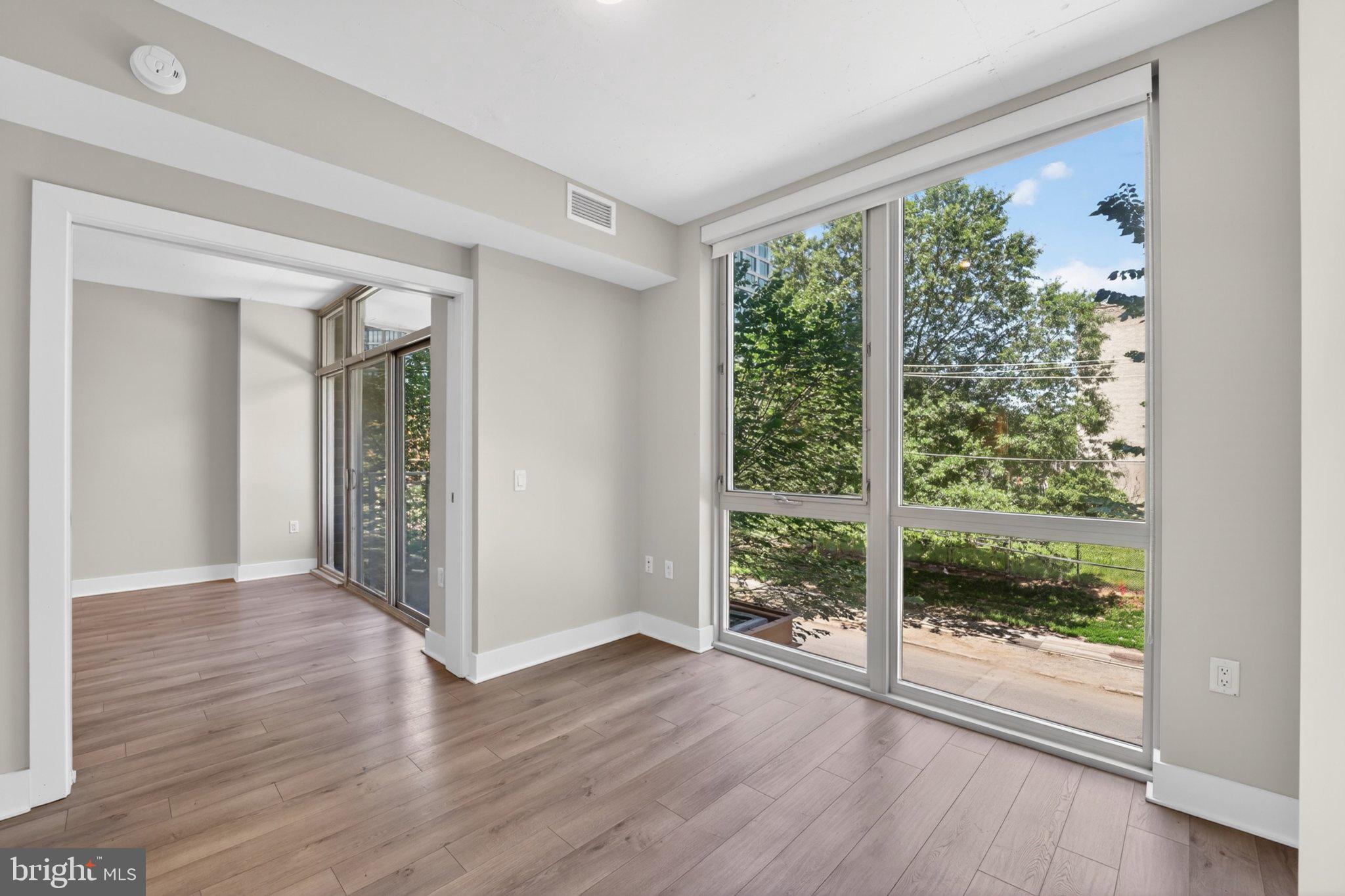 88 V Street Southwest, Unit 213 Washington, DC 20024 - Photo 17 of 26 Bright and airy modern living space.