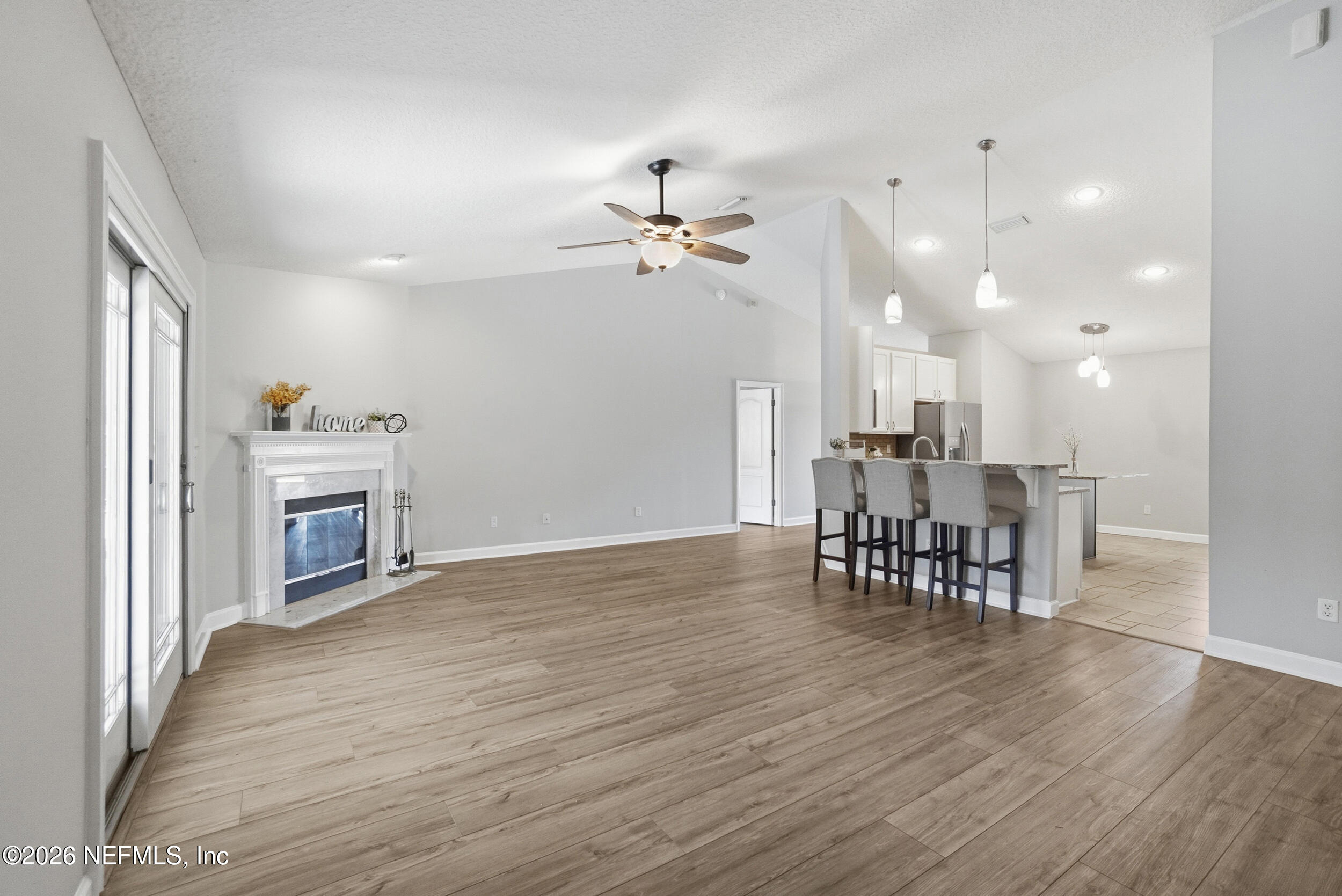 1194 Ardmore Street St. Augustine, FL 32092 - Photo 24 of 48 a view of a room with furniture and fireplace