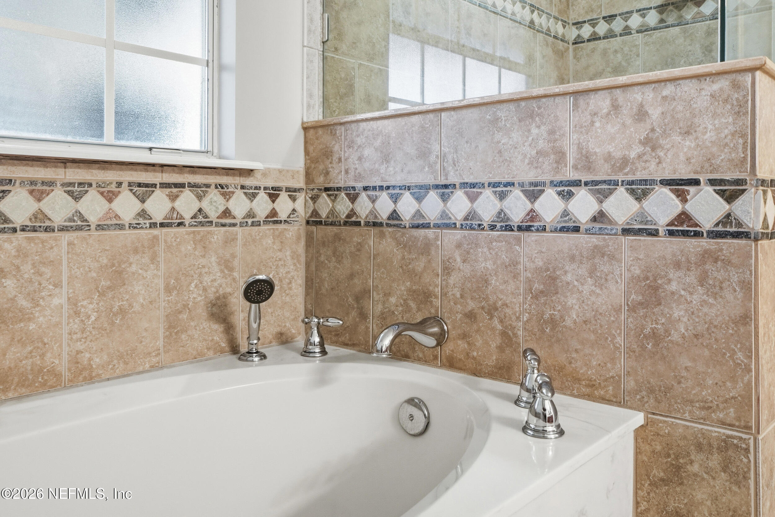 1194 Ardmore Street St. Augustine, FL 32092 - Photo 29 of 48 a bathroom with a sink and a mirror