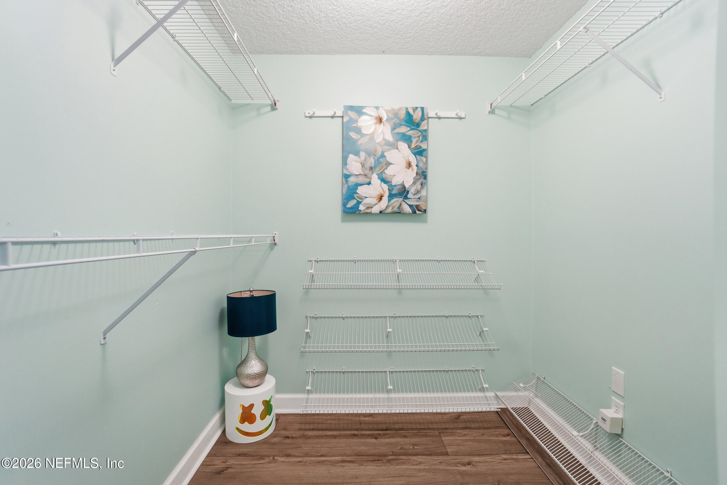 1194 Ardmore Street St. Augustine, FL 32092 - Photo 31 of 48 a bathroom with a picture on the wall