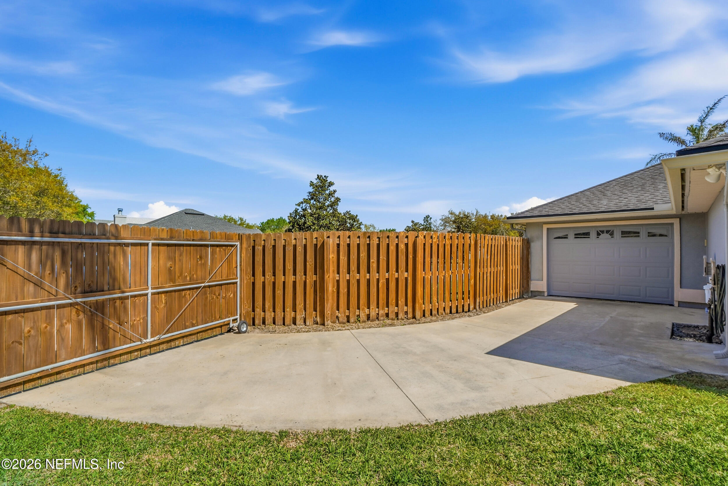 1194 Ardmore Street St. Augustine, FL 32092 - Photo 39 of 48 a view of backyard with wooden fence