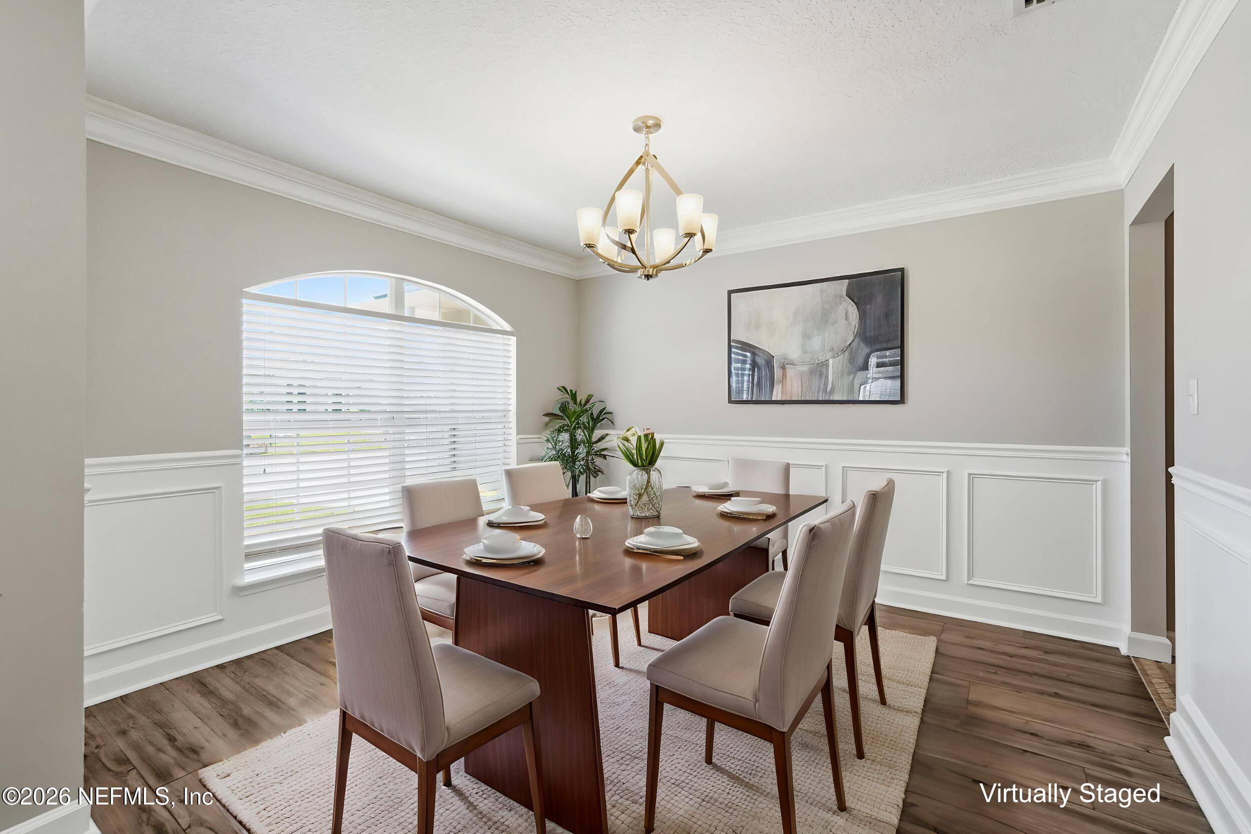 1194 Ardmore Street St. Augustine, FL 32092 - Photo 6 of 48 a dining room with furniture a chandelier and wooden floor