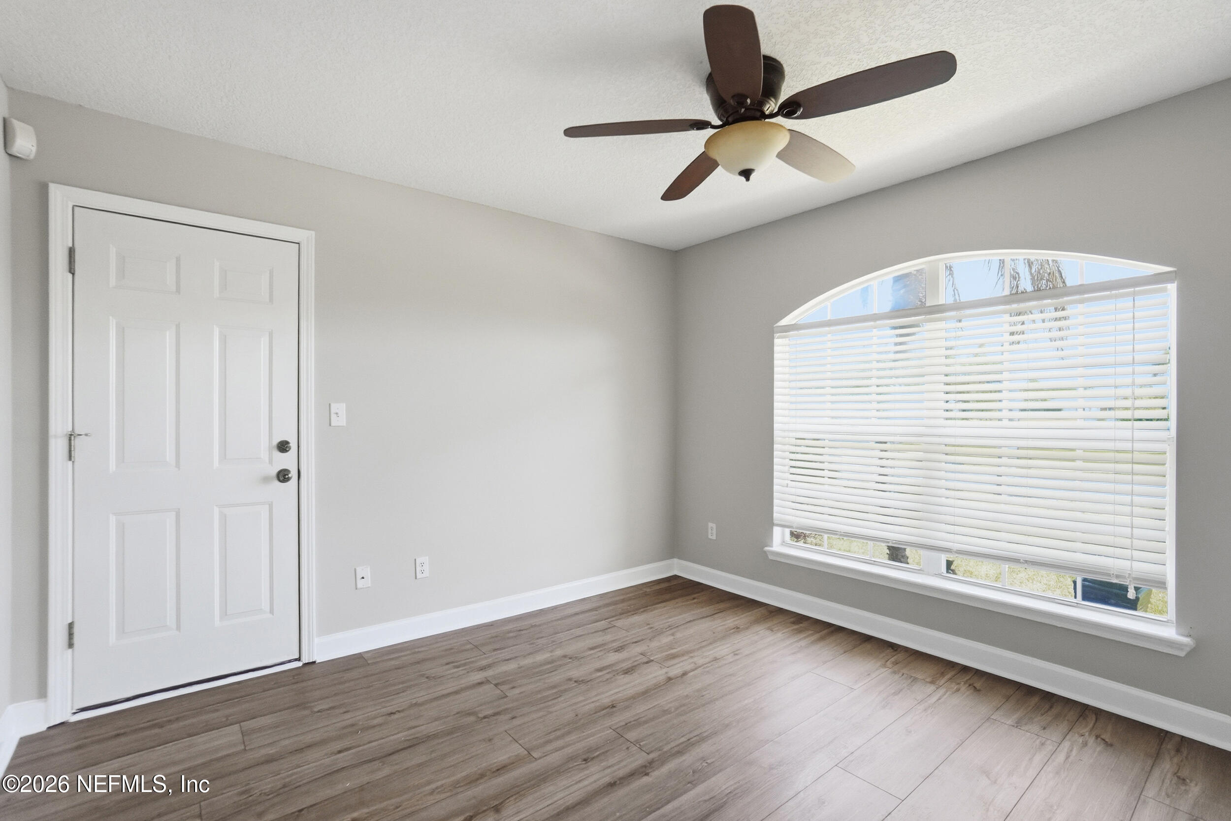 1194 Ardmore Street St. Augustine, FL 32092 - Photo 8 of 48 wooden floor in an empty room with a window