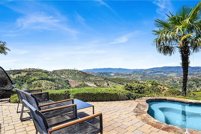 a view of a swimming pool with a lake view