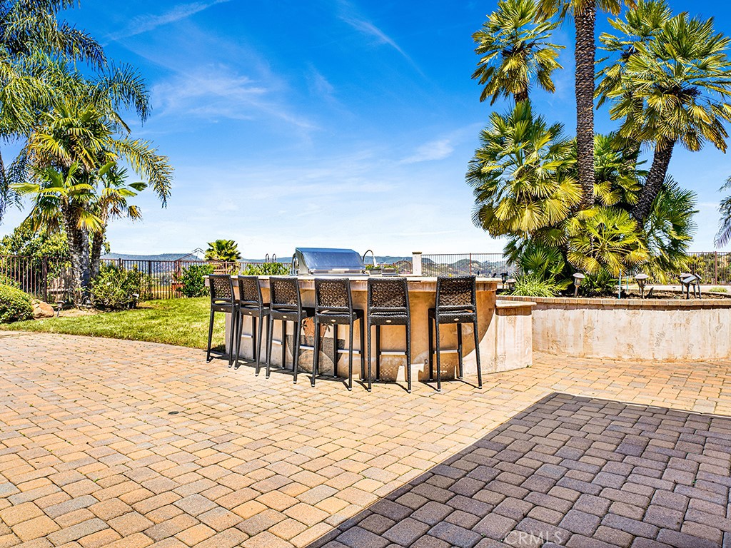 25900 Carancho Road Temecula, CA 92590 - Photo 17 of 58 a view of a terrace with furniture