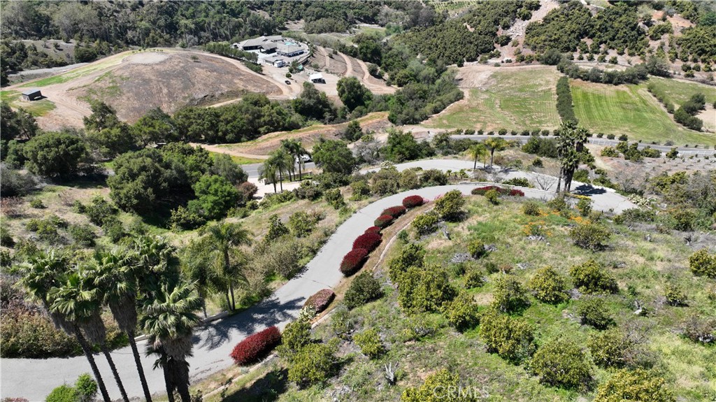 25900 Carancho Road Temecula, CA 92590 - Photo 2 of 58 an aerial view of residential houses with outdoor space