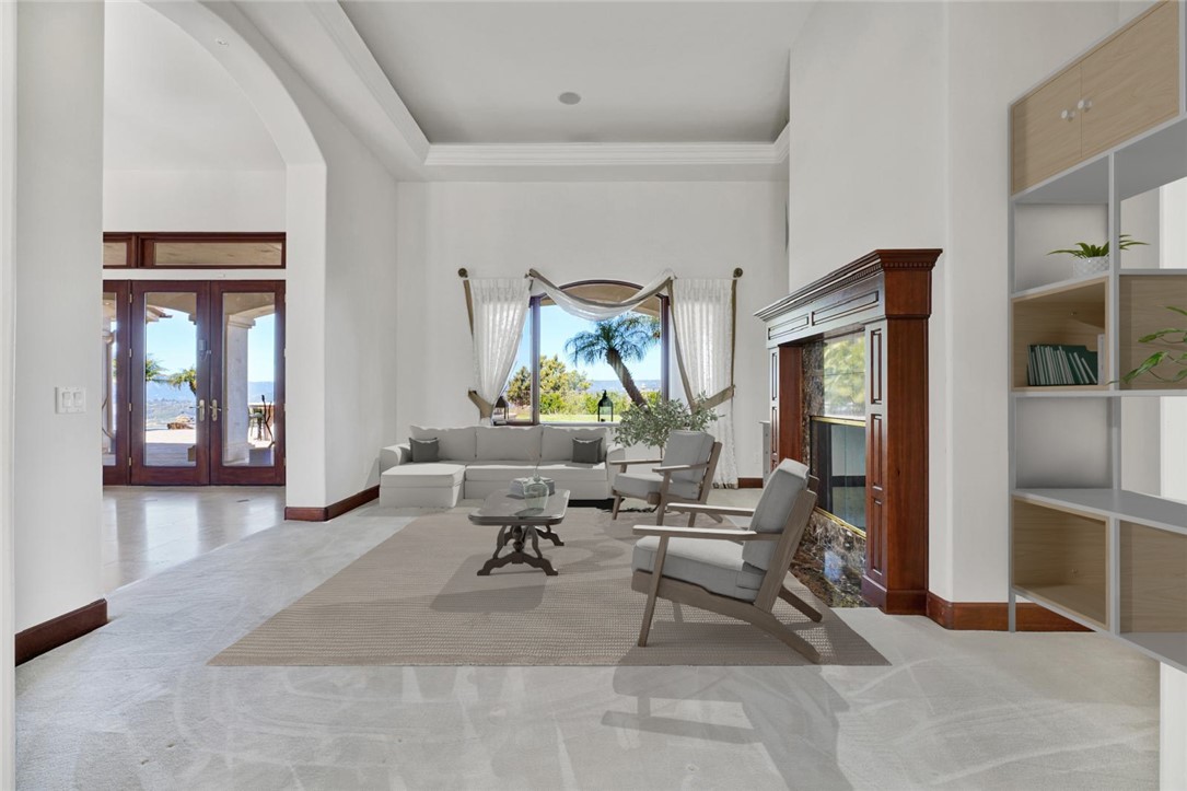 25900 Carancho Road Temecula, CA 92590 - Photo 25 of 58 a living room with furniture and wooden floor