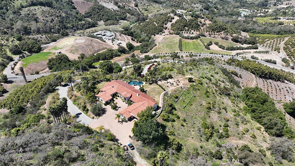 25900 Carancho Road Temecula, CA 92590 - Photo 3 of 58 an aerial view of a house with a yard