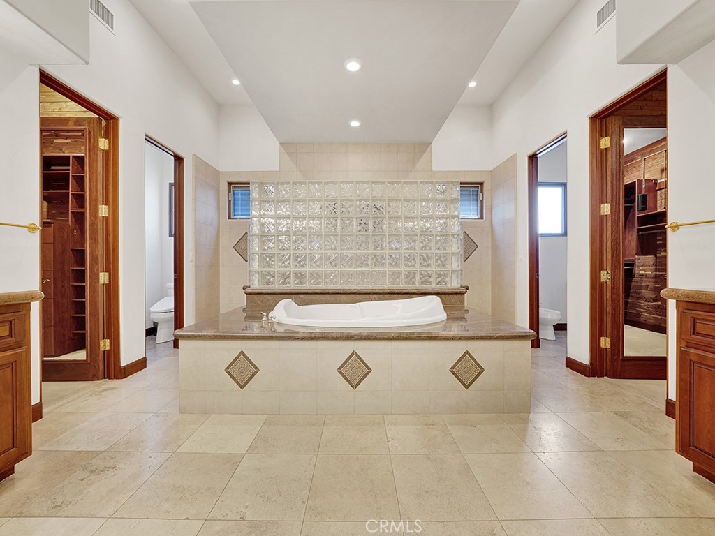 25900 Carancho Road Temecula, CA 92590 - Photo 34 of 58 a view of kitchen with stainless steel appliances granite countertop a refrigerator and a stove