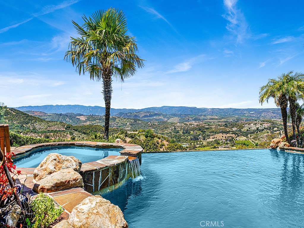 25900 Carancho Road Temecula, CA 92590 - Photo 10 of 58 a view of swimming pool with lake view and mountain view