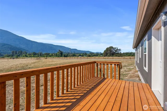 a view of wooden balcony with outdoor space