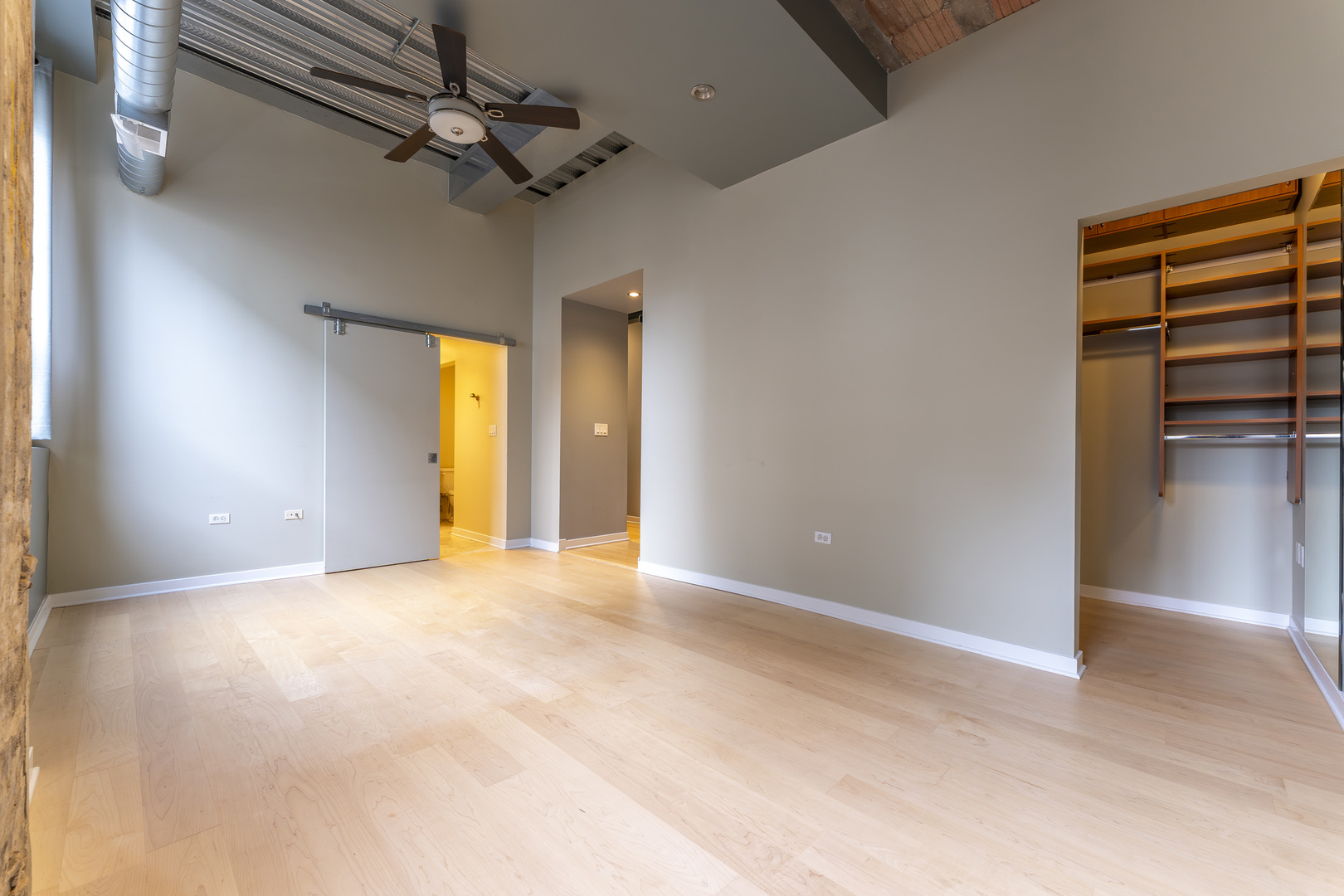 1910 South Indiana Avenue, Unit 421 Chicago, IL 60616 - Photo 12 of 28 a view of empty room with a ceiling fan