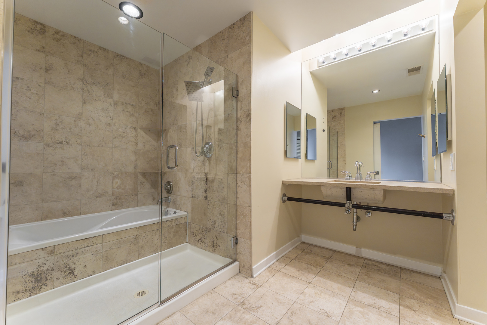 1910 South Indiana Avenue, Unit 421 Chicago, IL 60616 - Photo 14 of 28 a bathroom with a bathtub and a sink