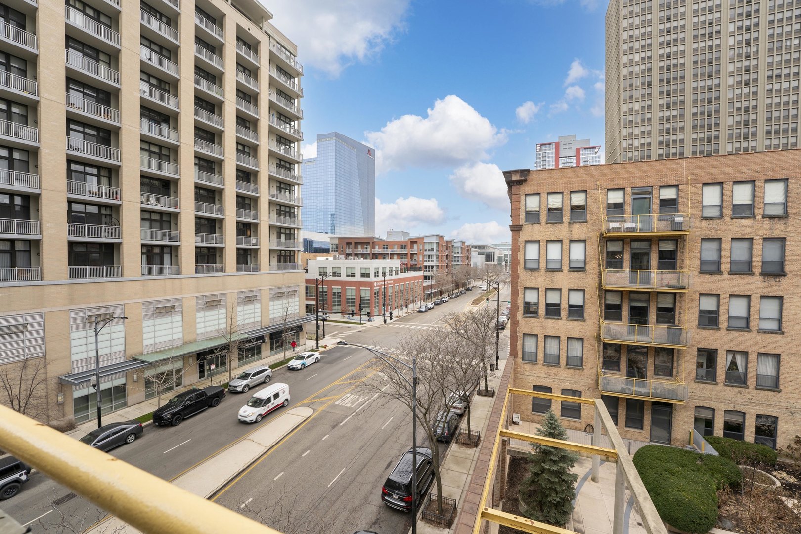 1910 South Indiana Avenue, Unit 421 Chicago, IL 60616 - Photo 23 of 28 a view of a buildings with yard