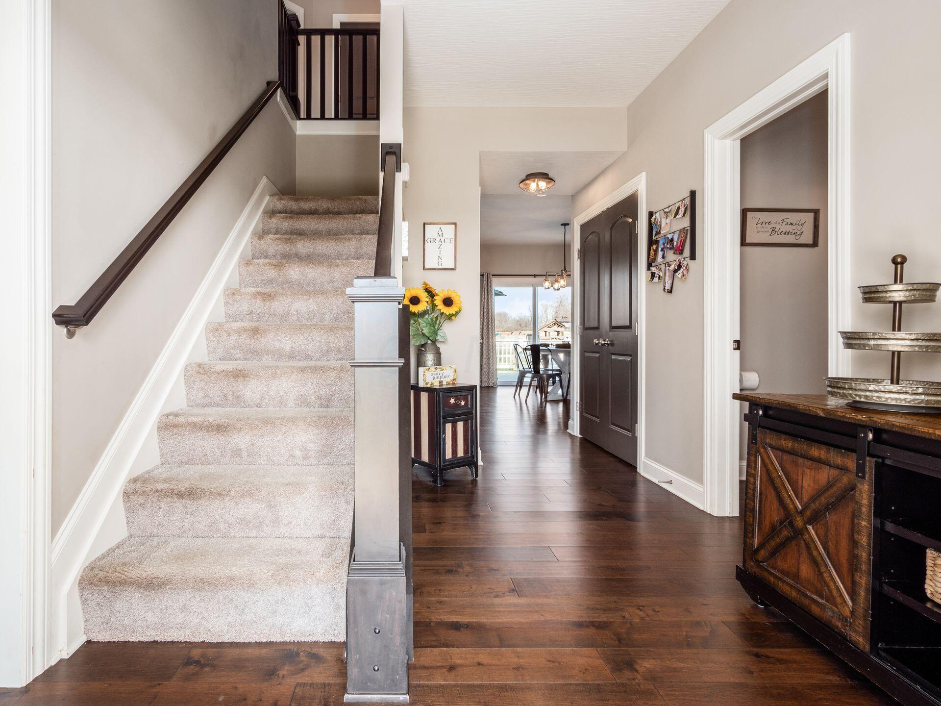 5408 Refugee Road Baltimore, OH 43105 - Photo 12 of 58 Gorgeous Hardwood Flooring On 1st Level. Coat Closet & Powder Room Are On The Left.