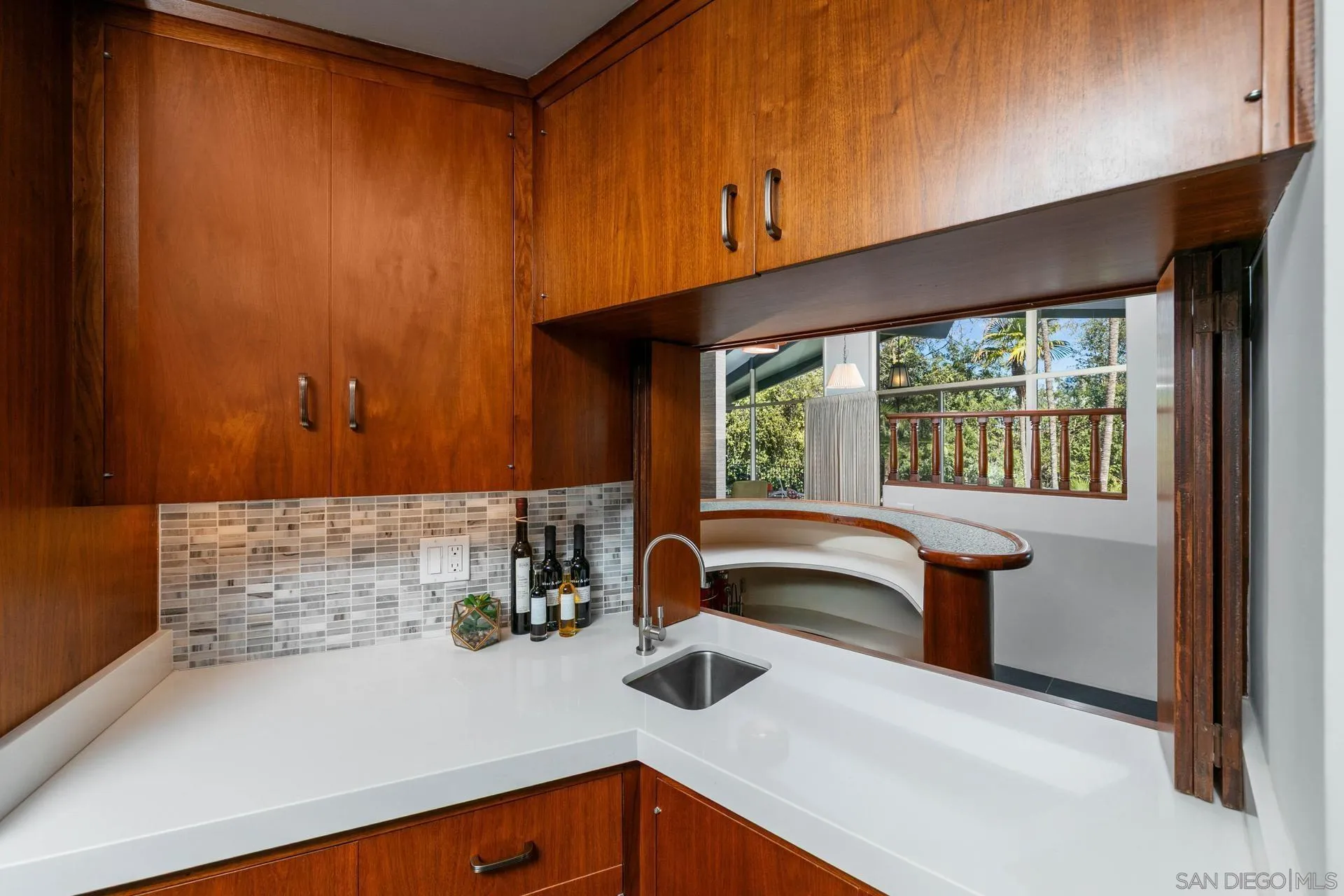 10446 Russell Road La Mesa, CA 91941 - Photo 14 of 75 a kitchen with a sink and a window