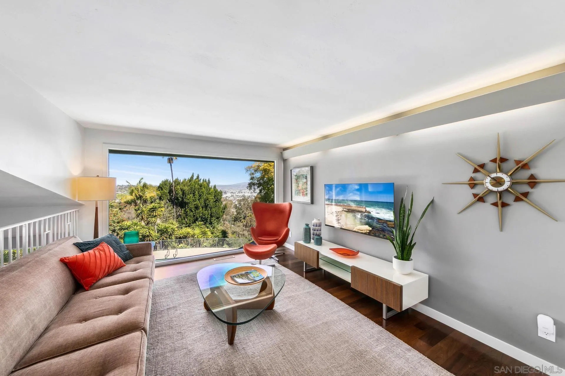 10446 Russell Road La Mesa, CA 91941 - Photo 23 of 75 a living room with furniture and a wooden floor