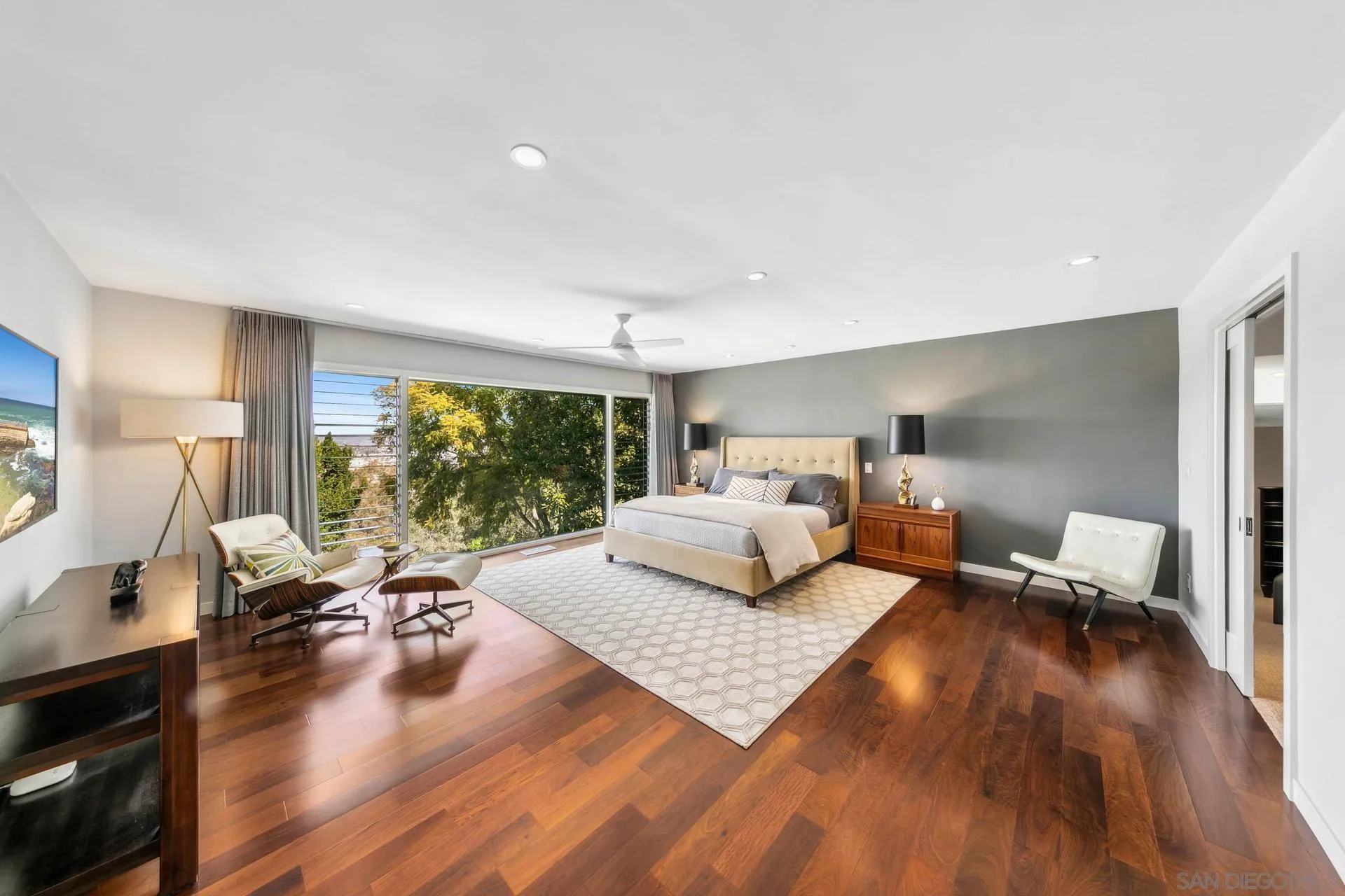10446 Russell Road La Mesa, CA 91941 - Photo 26 of 75 a living room with furniture and a wooden floor