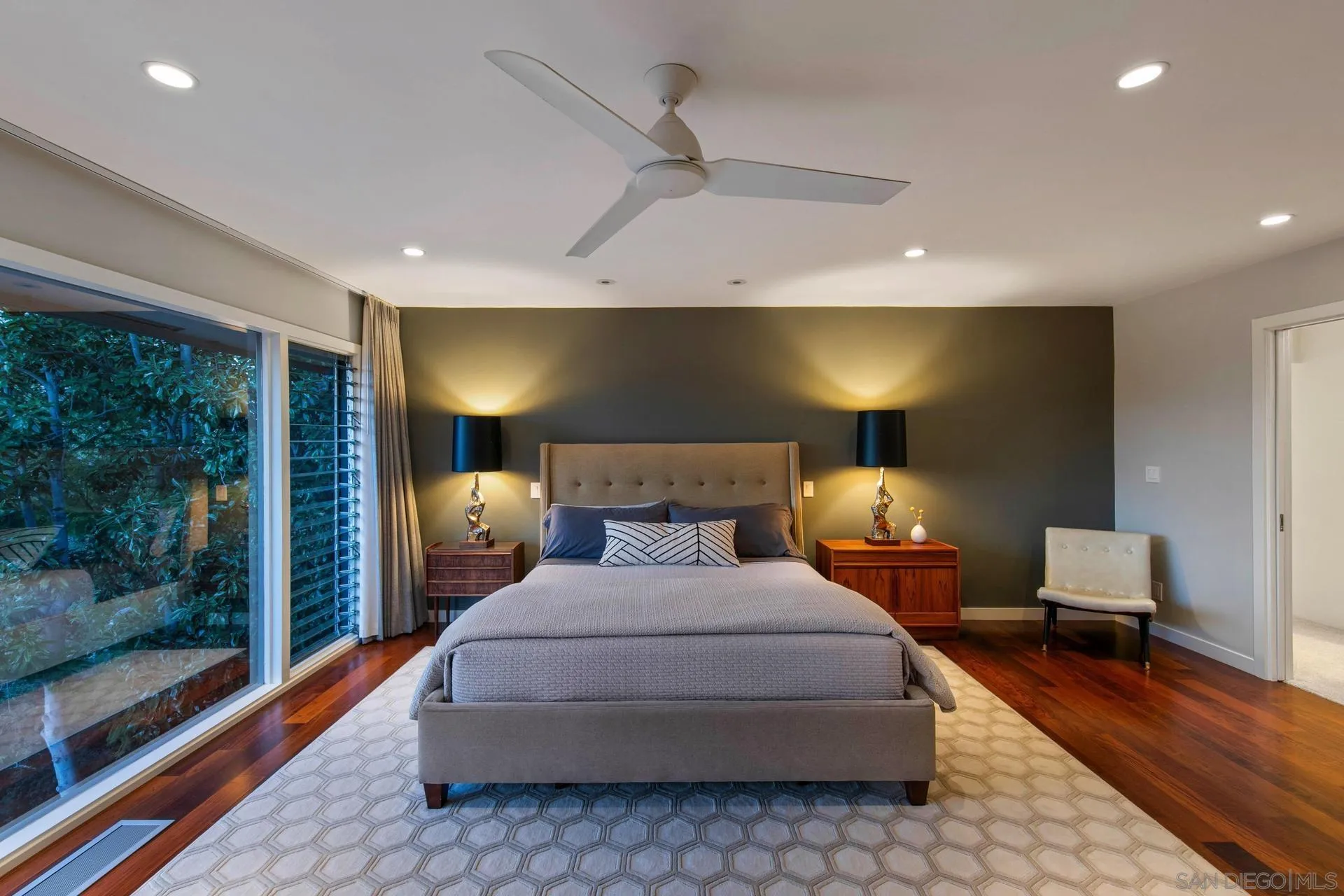 10446 Russell Road La Mesa, CA 91941 - Photo 27 of 75 a bedroom with a bed mirror and window
