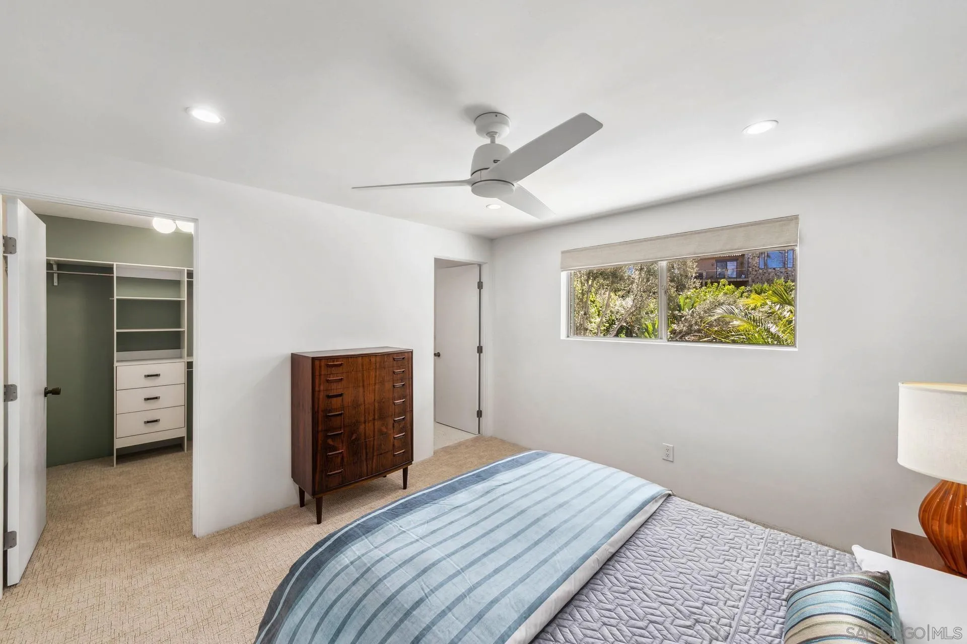 10446 Russell Road La Mesa, CA 91941 - Photo 37 of 75 a bedroom with a bed and a view of bedroom