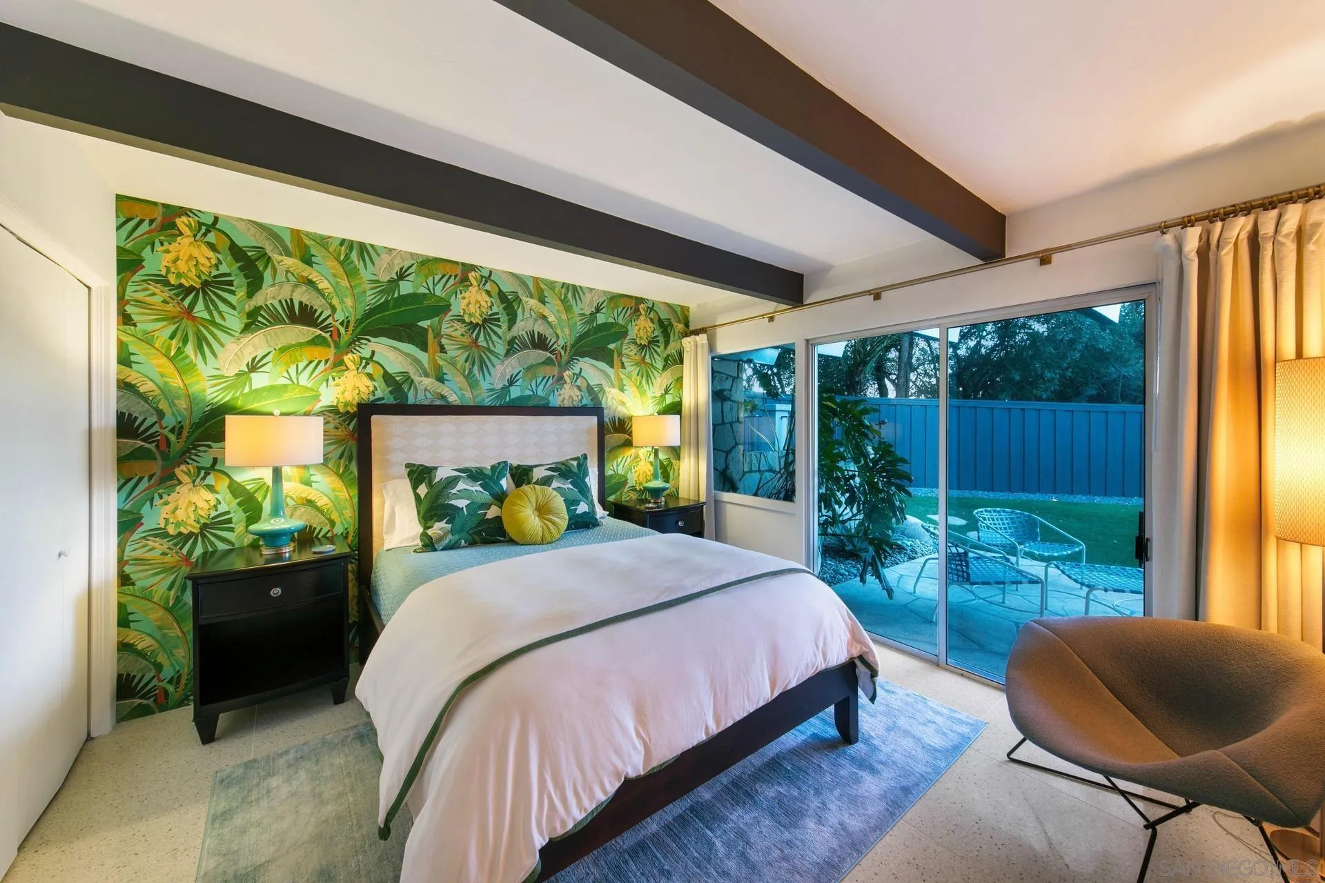 10446 Russell Road La Mesa, CA 91941 - Photo 43 of 75 a bedroom with a bed and a couch