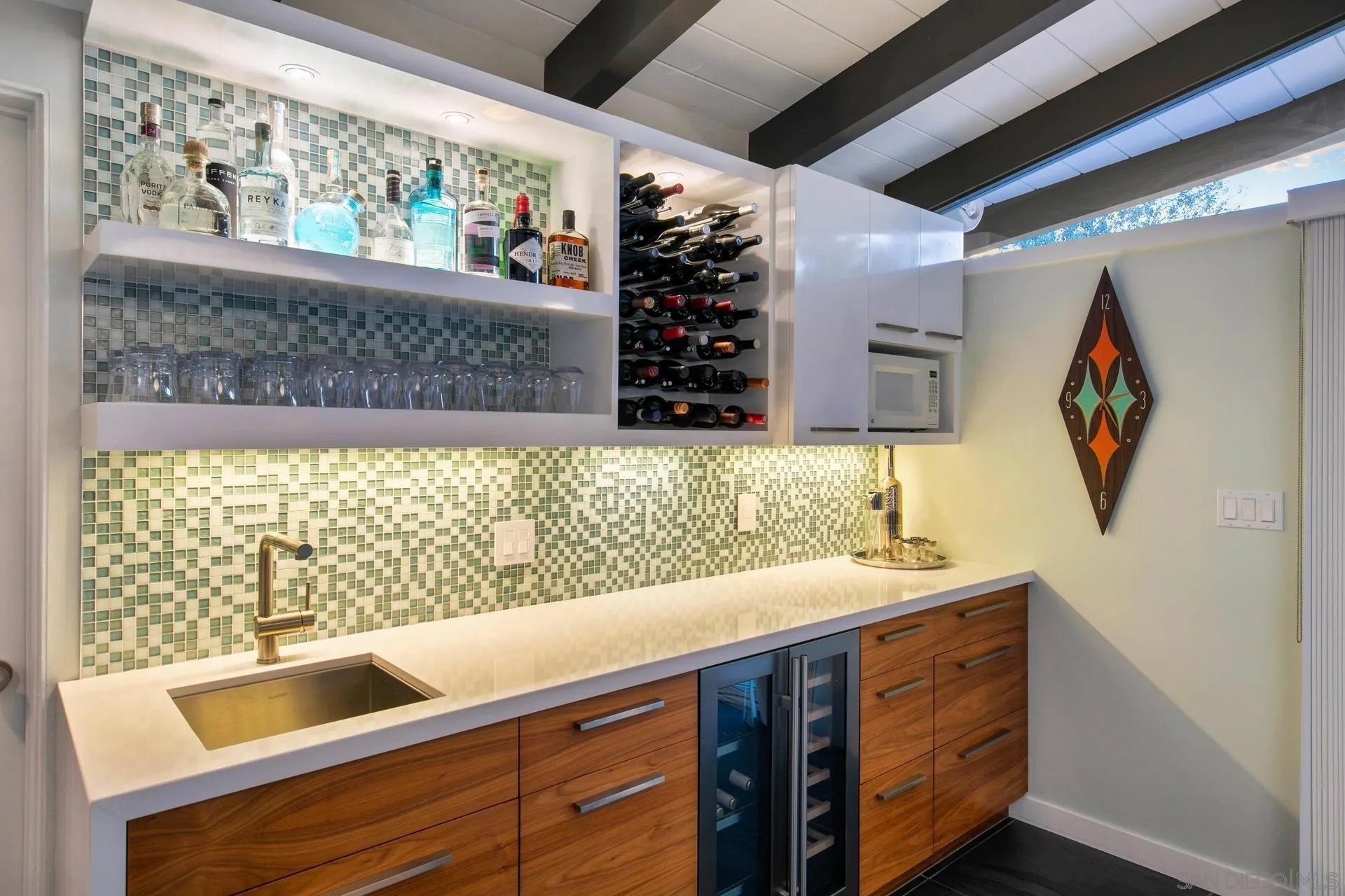 10446 Russell Road La Mesa, CA 91941 - Photo 50 of 75 a bathroom with a sink and a large mirror