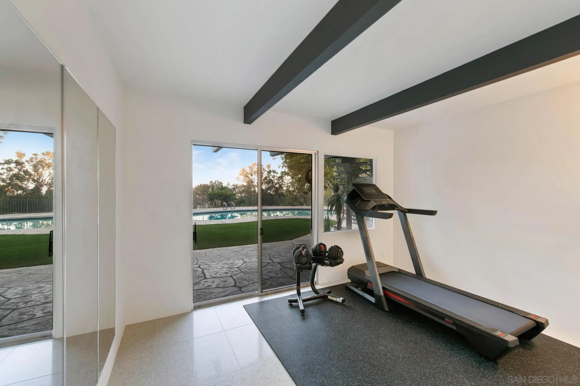10446 Russell Road La Mesa, CA 91941 - Photo 52 of 75 a view of a room with gym equipment