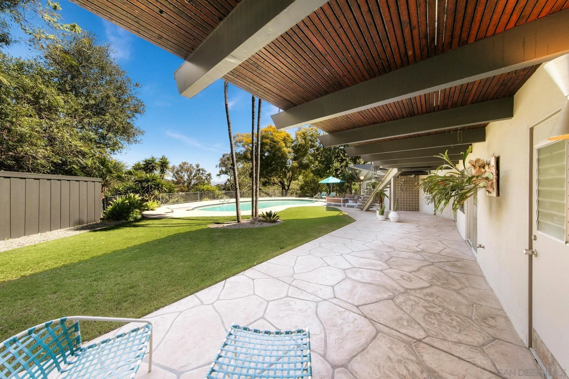 10446 Russell Road La Mesa, CA 91941 - Photo 57 of 75 a view of a house with backyard and a tree