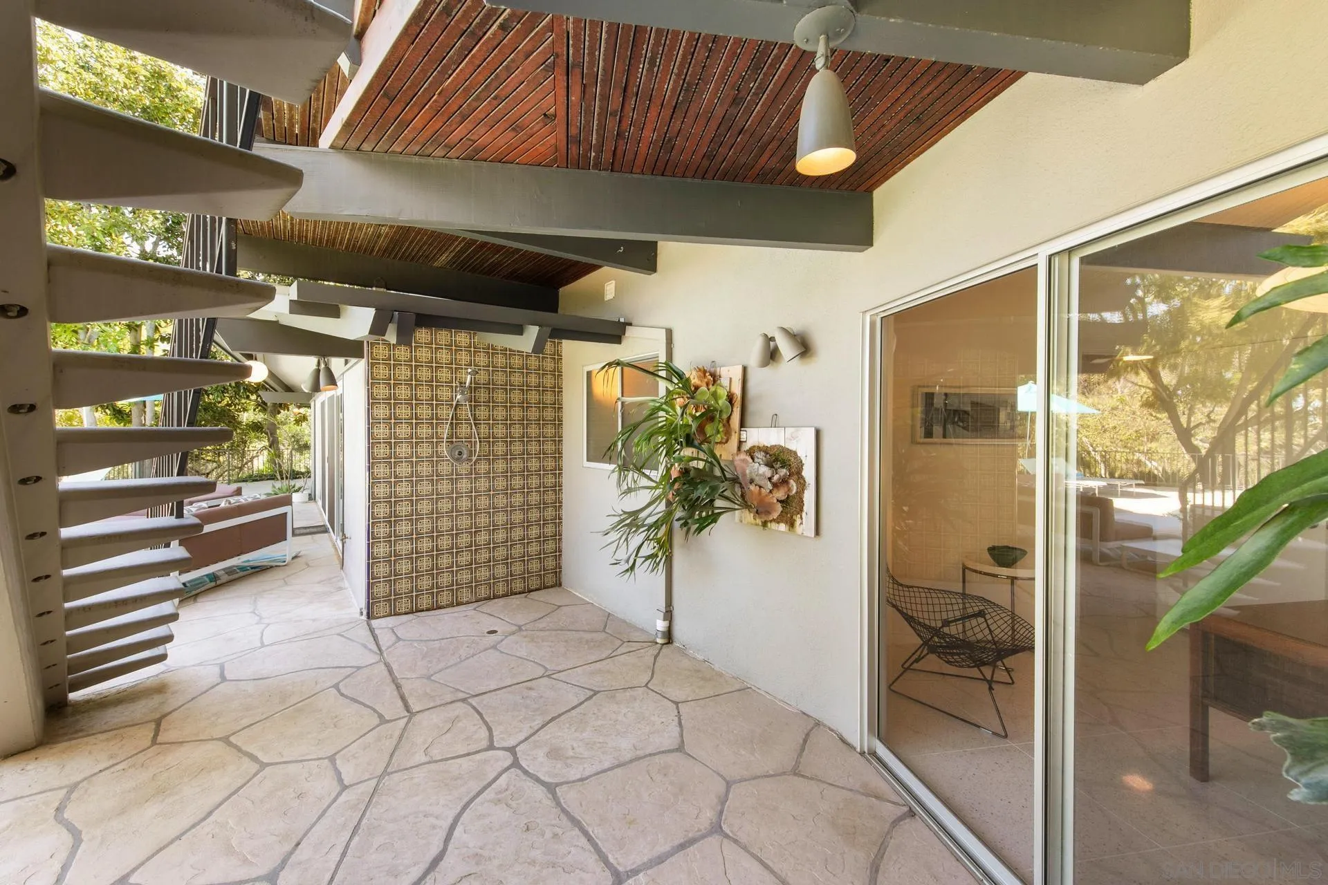 10446 Russell Road La Mesa, CA 91941 - Photo 58 of 75 a view of a porch with a glass door and furniture