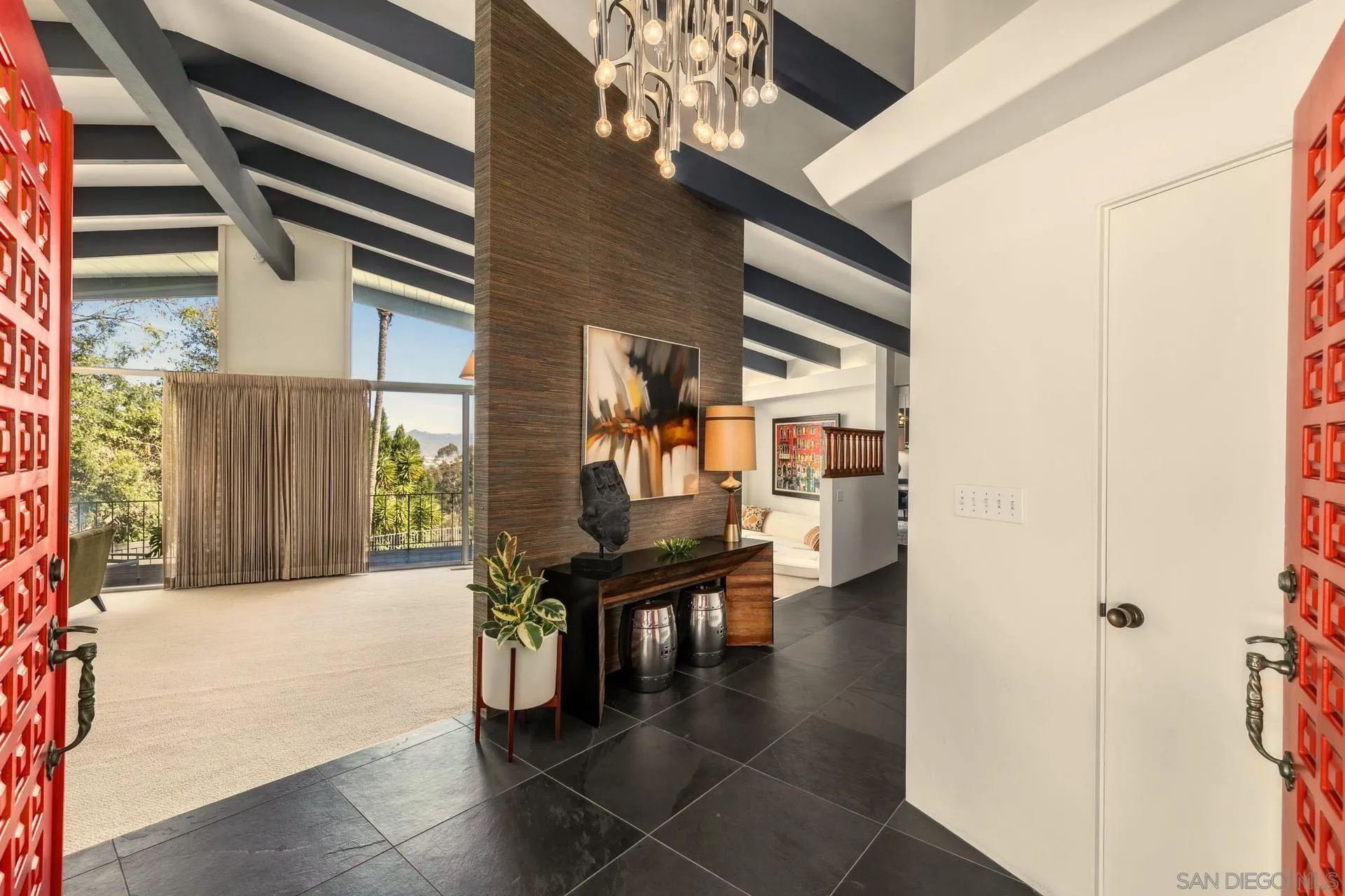 10446 Russell Road La Mesa, CA 91941 - Photo 6 of 75 a view of entryway and hall with dining room