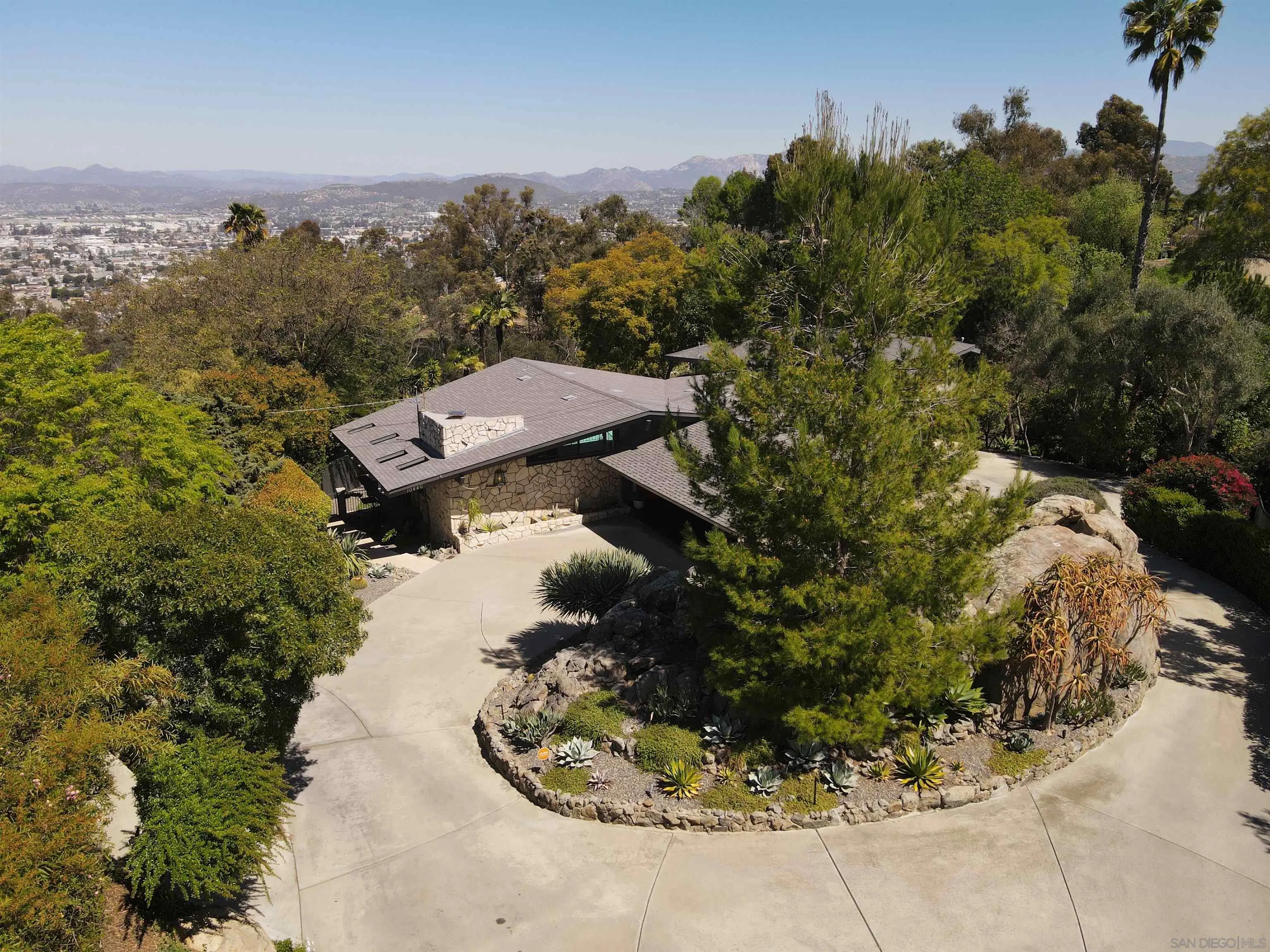 10446 Russell Road La Mesa, CA 91941 - Photo 73 of 75 an aerial view of a house with a yard and garden
