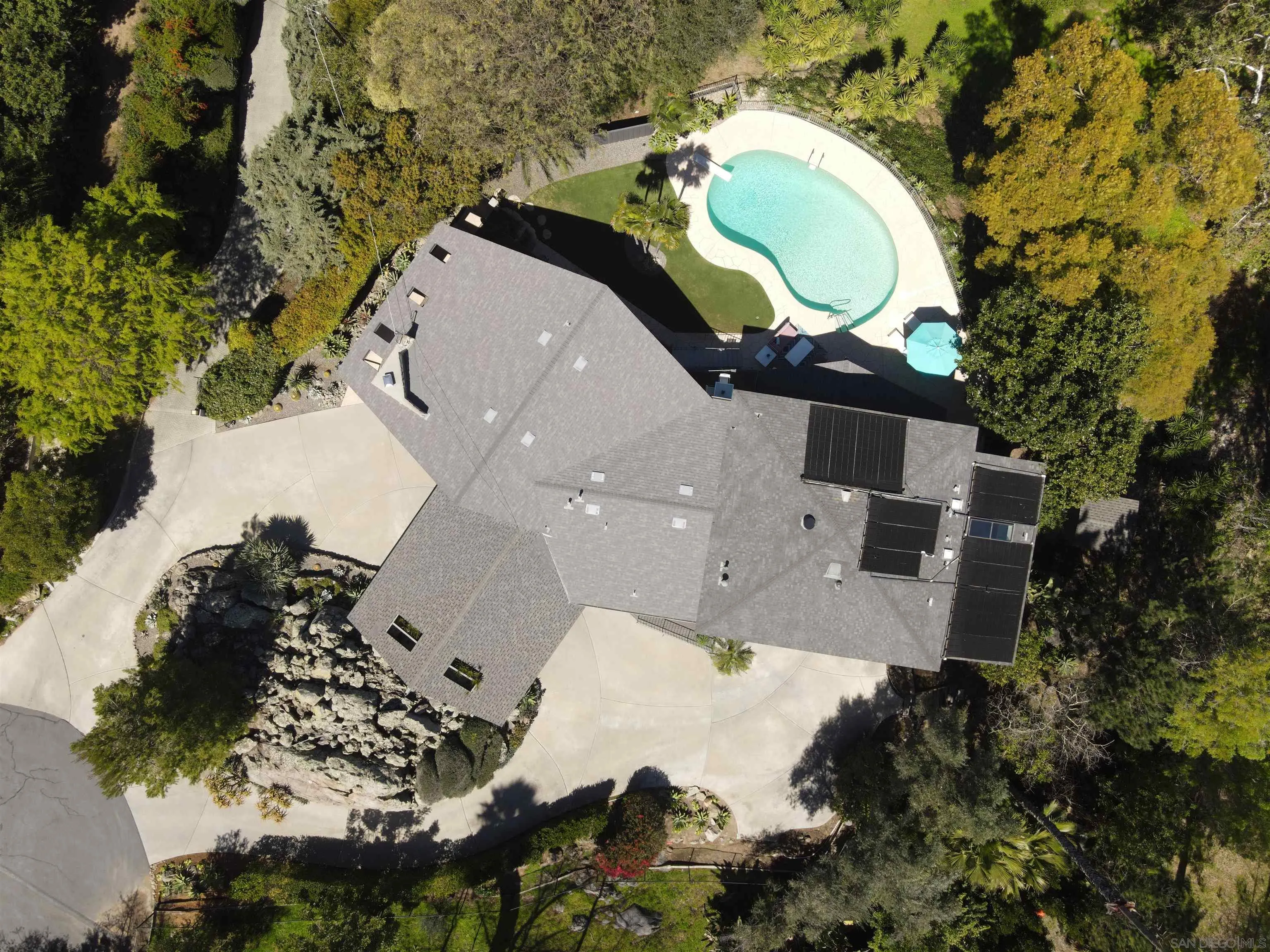 10446 Russell Road La Mesa, CA 91941 - Photo 74 of 75 an aerial view of a house with a swimming pool patio and outdoor seating